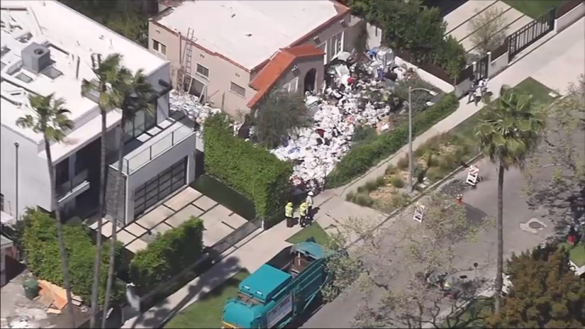 LA begins removing piles of trash from Fairfax home  NBC Boston [Video]