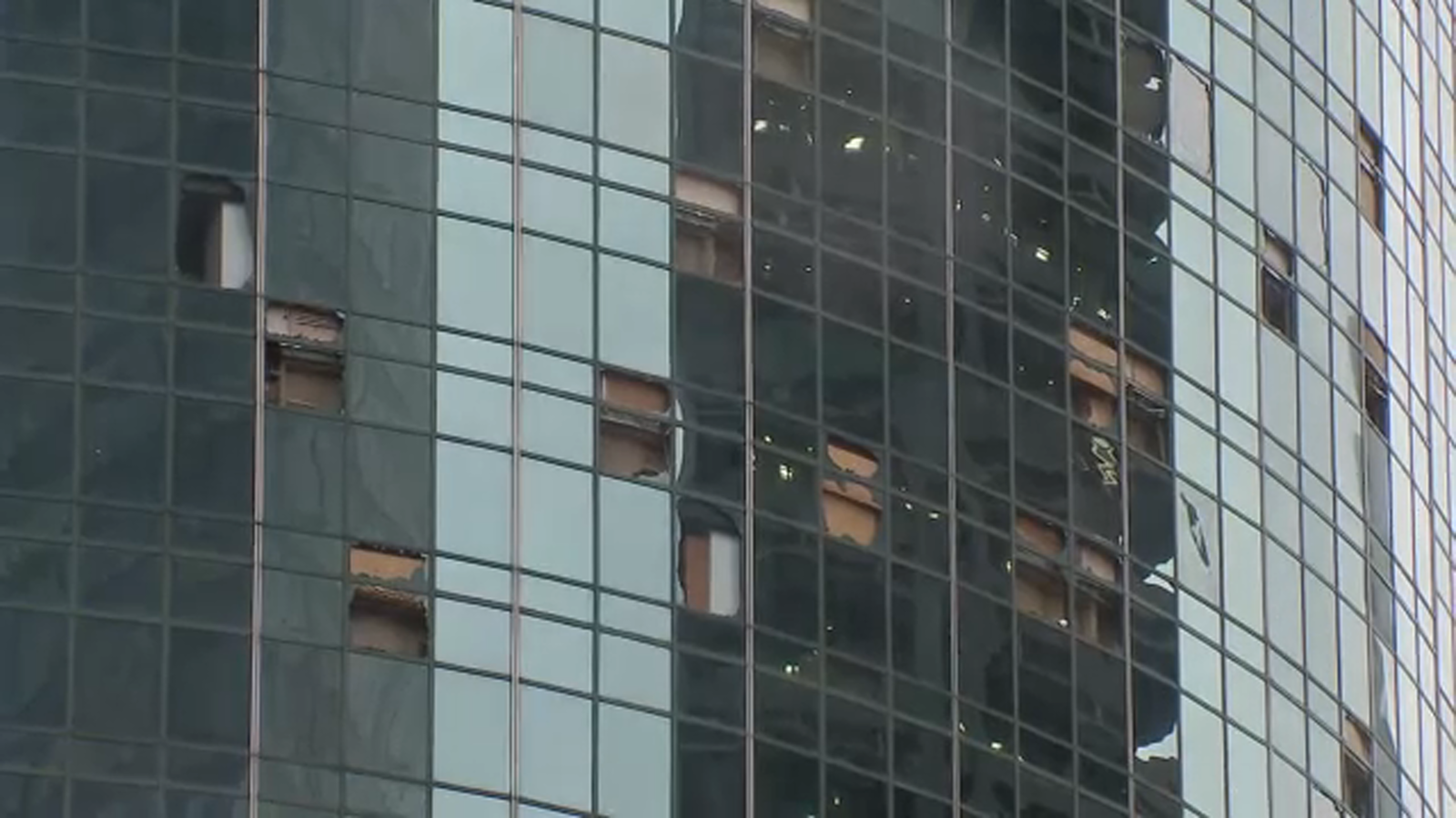 Downtown Houston riddled with glass and other debris after destructive storm tore windows out of high-rise buildings [Video]